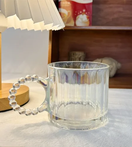 مج شفاف يد خرز